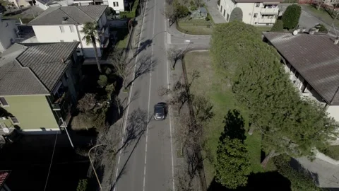 Aerial drone image of a small town in northern Italy. Houses, streets and cars. Stock Footage 170293903