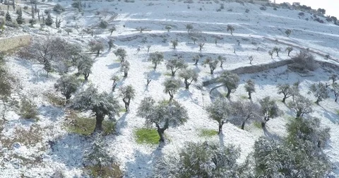 Aerial drone Israel Middle Eastern city Jerusalem snow Mount Scopus lookout Stock Footage 79078560