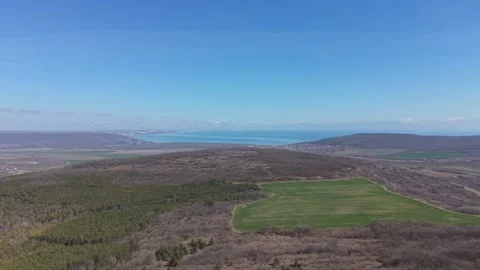 Aerial drone landscape of green fields forest and village 스톡 동영상 330768682