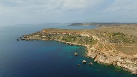 Aerial drone landscape view of the cliffs, sea. Gozo on background, Malta island Stock Footage 246475490