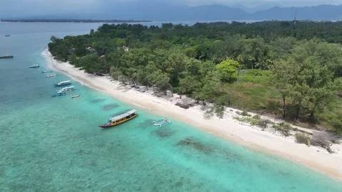Aerial Drone Lateral Flight Along Gili Meno Coastline With Lombok and Gili Air Stock-Footage 330977565