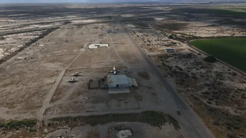 Aerial Drone Looking Down at Abandoned Airfield In the Desert Video stock 157982743