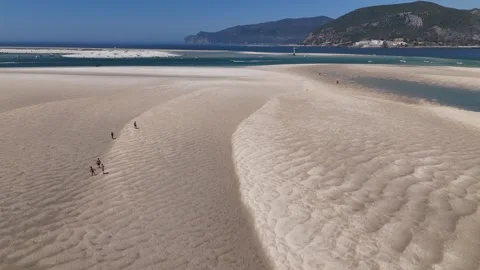 Aerial drone low altitude view of the stunning sand banks in Troia Portugal Stock Footage 314119244