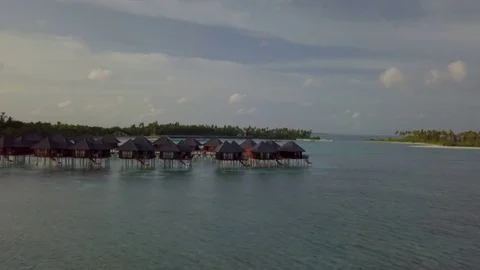 Aerial Drone Low Angle Towards Water Villas in the Maldives, Olhuveli Stock-Footage 80949316