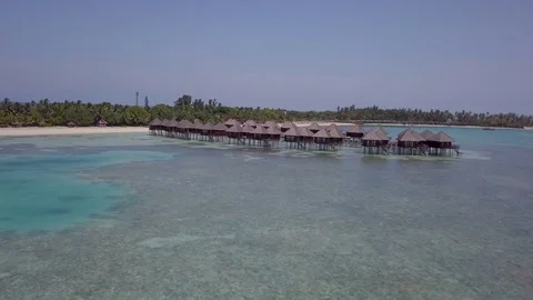 Aerial Drone Low Track Towards Water Villas Stock-Footage 80925209