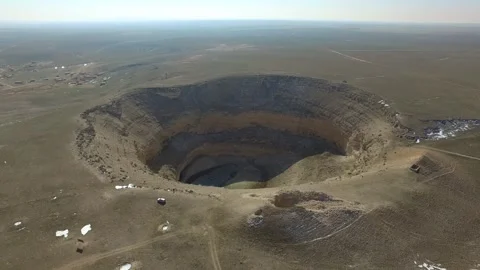 Aerial drone massive sinkhole formed by underground - Soil Textures and Terrain Stock Footage 339560984