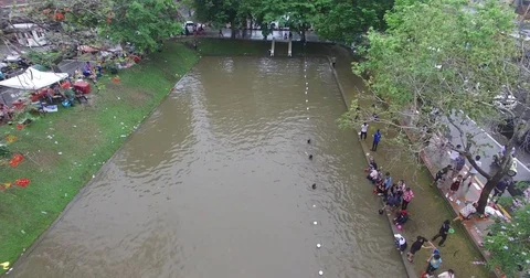 Aerial Drone Moat Reverse Thai New Year (Songkran) Water Fights Chiang Mai 動画素材 76914220