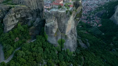 Aerial Drone Monastery of Holy Trinity Sunset in Meteora, Greece. Fly Strai.. Stock Footage 334893633