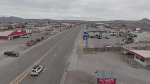 Aerial Drone Moving Forward Past Route 66 Sign in Seligman Arizona Stock-Footage 324937538