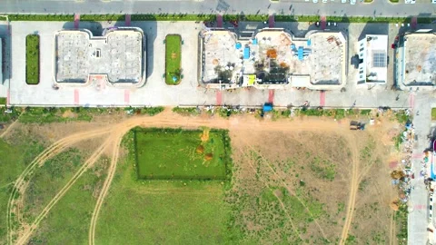 Aerial drone moving forward straight down show showing midway rest area pitstop Stock Footage 305934648