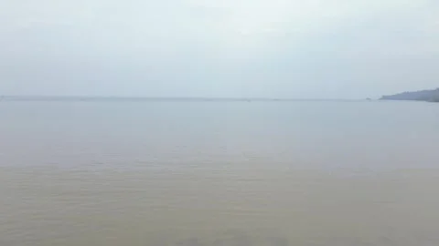 Aerial Drone Moving from Sandy Beach to Open Ocean Stock Footage 326327911
