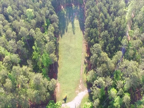 Aerial Drone Moving Tilt Down from Horizon to Cemetery Stock Footage