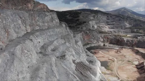 Aerial drone next to to quarry steps cloudy day Stock Footage 269508973