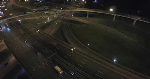 Aerial drone night flight over  highway interchange Stock Footage 69152961