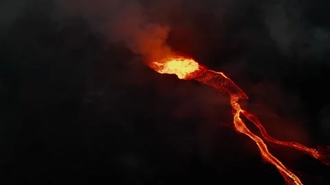 Aerial Drone Night View of Active Volcano Eruption with Flowing Lava River Stock Footage 322180625