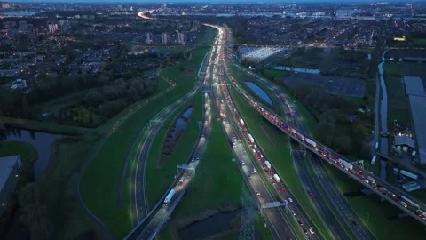 Aerial drone night view of a multi-level highway intersection with moving cars Stock Footage 316276320