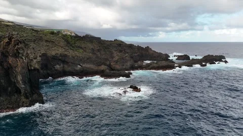 Aerial Drone Orbit Around Charco del Viento Natural Pools Tenerife Stock Footage 328431810