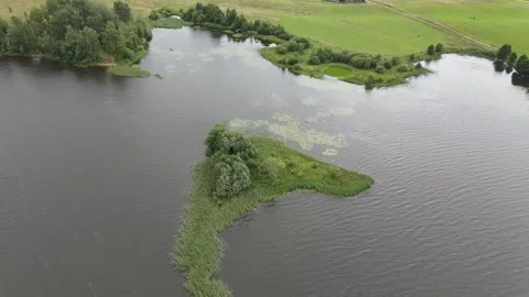 Aerial drone orbit around a small scenic island in Lake Seliger. Stock Footage 338094435