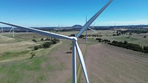 Aerial Drone Orbit Around Wind Turbine Stock Footage 332749990