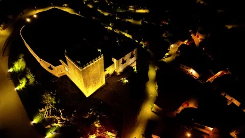 Aerial drone orbit of the Medieval castle of Belmonte, Portugal at night Stock Footage 296006168
