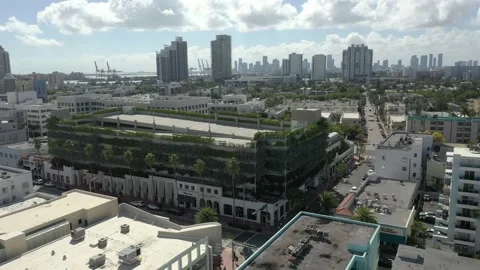 Aerial Drone Orbit Shot Tree Covered 7th Street Garage South Beach Miami Florida Stock Footage 150573228