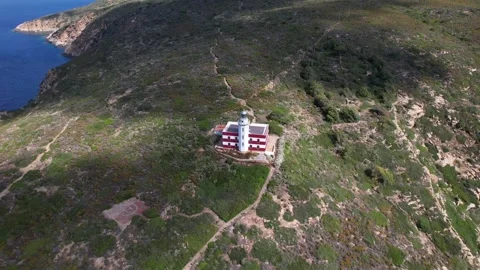 Aerial drone orbit view Capel Rosso Lighthouse Giglio Island Italy Stock-Footage 244945343