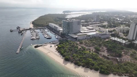 Aerial drone orbit view of marina and restaurants in Troia, Portugal Stock Footage 319452008
