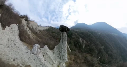 Aerial drone orbiting around Pyramids of Zone in Italy Stock Footage 342676541