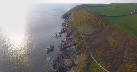 Aerial Drone over Devon rocks cliffs and sea United Kingdom Video stock 88248472