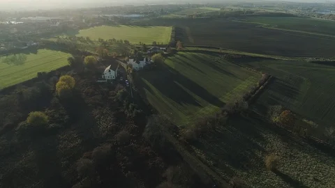 Aerial drone over fields with sun glare Video stock 122587651