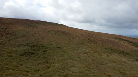 Aerial Drone Over Moor with Dramatic Sky Clouds on Exmoor Devon UK 4K Stock Footage 163023419