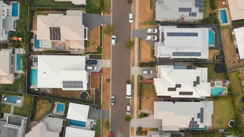 Aerial Drone Overhead Suburban Streets and Houses - Solar Panels Covering Roofs Stock Footage 123745481
