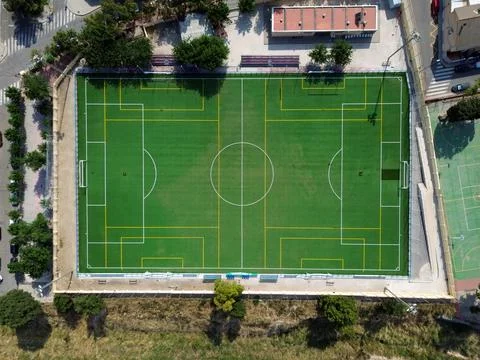 Aerial Drone Overhead View of Multi Sport Field with Green Artificial Turf Stock Photos