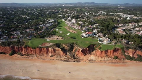 Aerial drone overview of golf courses at Vale do Lobo, Algarve, Portugal, Europe Stock Footage 244536127