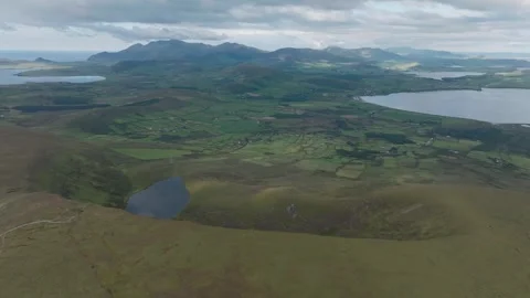 Aerial Drone Pan Of Dingle Peninsula Mountains And Lakes Ireland Stock-Footage 330920659