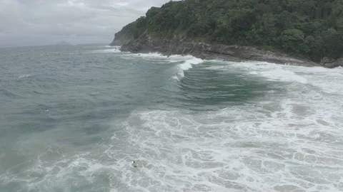 Aerial drone pan tracking wave break in tropical beach BR UBA DJI 0765 B Stock Footage 140187977