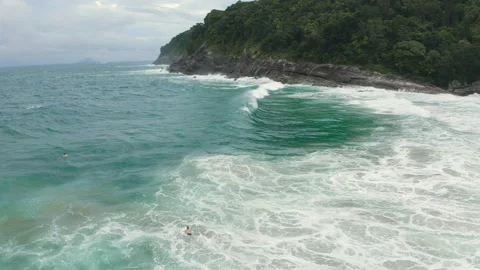Aerial drone pan tracking wave break in tropical beach BR UBA 0765 B GR Stock Footage 143286837