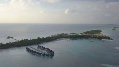 Aerial Drone Panning Left Along the Length of Olhuveli in the Maldives Stock-Footage 80950825