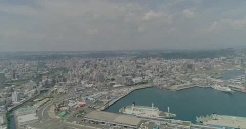 Aerial Drone Panning Left from Kagoshima Harbor to City, Kyushu, Japan Stock Footage 343737009