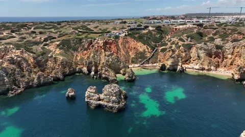 Aerial drone panorama view of idyllic nature landscape rocky cliff boats sailing Stock Footage 201733127