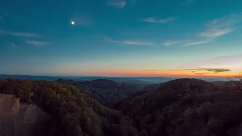 Aerial drone panoramic view of a beautiful scenic mountain landscape at dusk Video stock 150884136