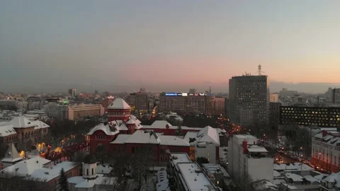 Aerial drone panoramic view of Bucharest Victory square city skyline at sunset Stock Footage 131235723