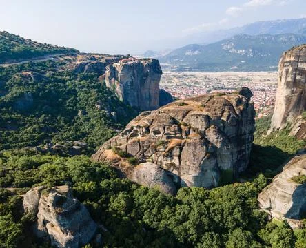 Aerial drone panoramic view of deep gorge and rocky ridge leading to legendar Stock Photos