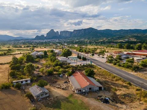 Aerial drone panoramic view of deep gorge and rocky ridge leading to legendar Stock Photos