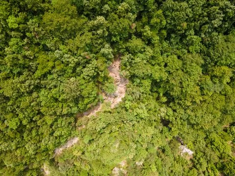 Aerial drone panoramic view of deep gorge and rocky ridge leading to legendar Stock Photos