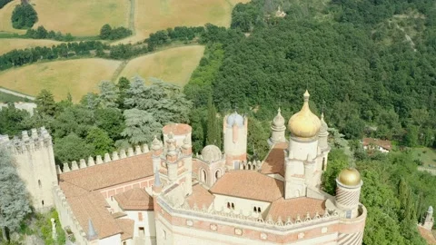 Aerial drone panoramic view of the Rocchetta Mattei castle in Italy on sunny Stock Footage 203857301