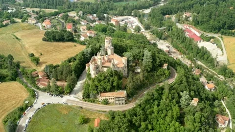 Aerial drone panoramic view of the Rocchetta Mattei castle in Italy on sunny Stock Footage 204882763