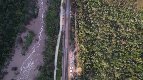 Aerial drone parallel flight of flooded river and railway Stock Footage 161140635