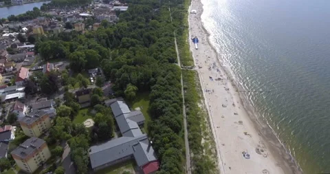 Aerial drone path along the beach and ocean, river and lakes in the background Stockbeeldmateriaal 94859878