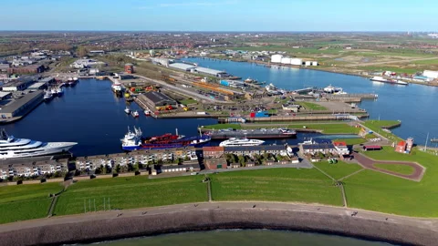 An aerial drone perspective captures the industrial port of Vlissingen Video stock 335316480